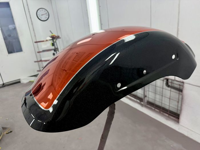 Black to copper fade PVD fender in the booth