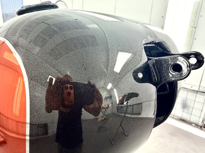 Textured gunmetal PVD finish on a helmet shell